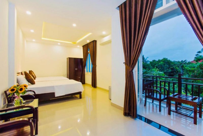 Vườn cây xanh mát tại Red Flower Cottage Homestay